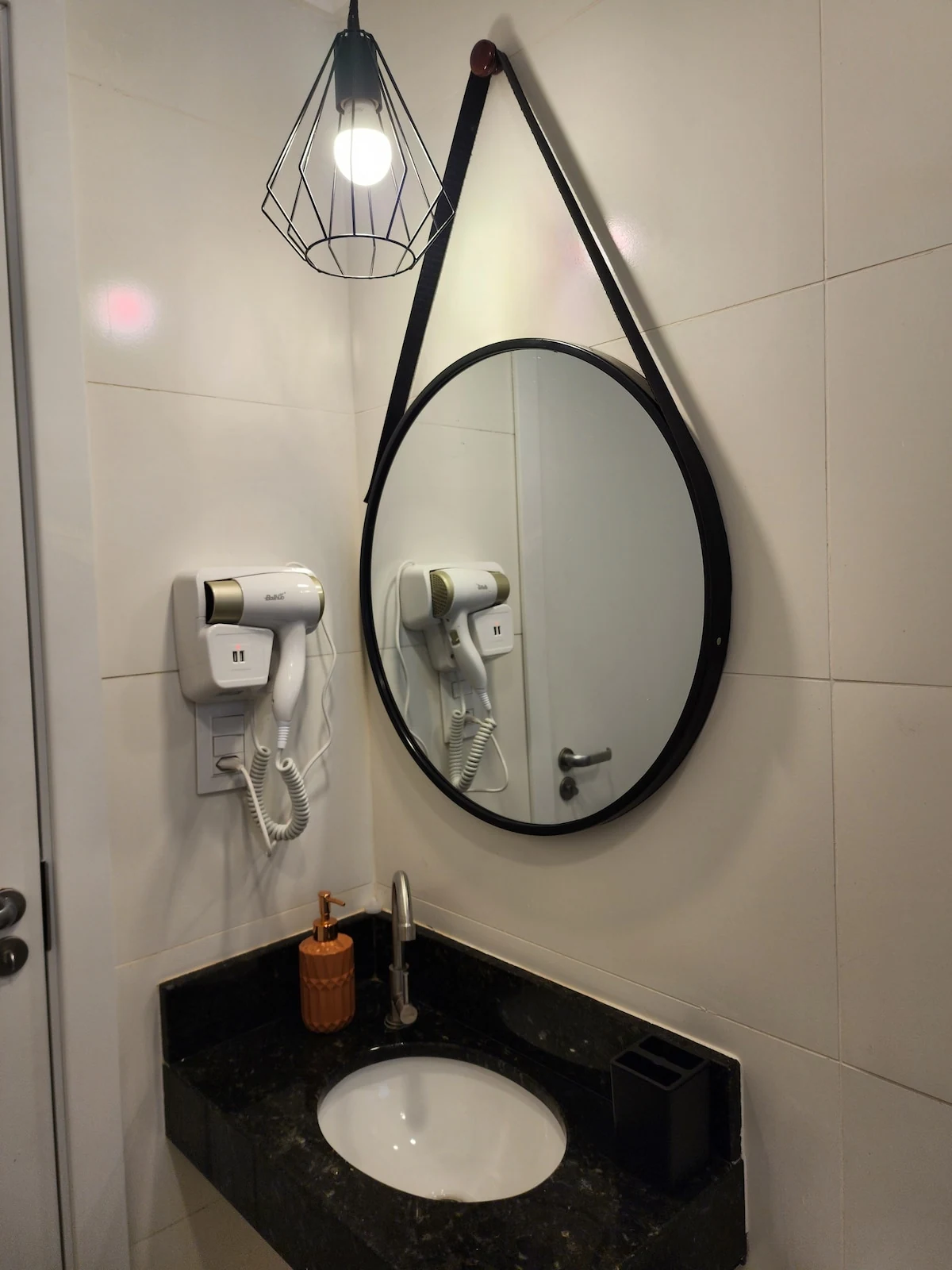 Secador de cabelo, apartamento pé na areia em Praia Grande